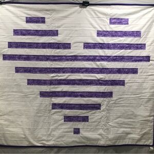 Kids throw or crib blanket. Purple stripe hearts with flannel back.